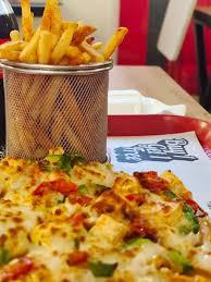 Vegetable pizza+ masala fries (combo)