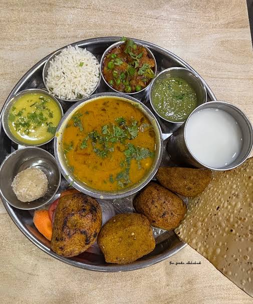 वृंदावन स्पेशल थाली ( Laddoo • Bafla • Paniya • Baati • Kadhi • Chawal • Dal, Sabji Mix • Dal Masaledar (Spicy) • Chhachh • Papad • Green Salad  • Chutney)