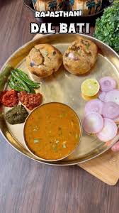 Daal Bati Thali ( dal , bati , salad , chutney , achar )