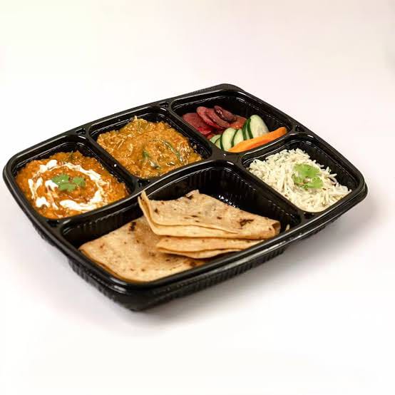 Basic Thali (2 Sabji, Dal Fry, Plain Rice, Butter Roti (5), Onion Salad)